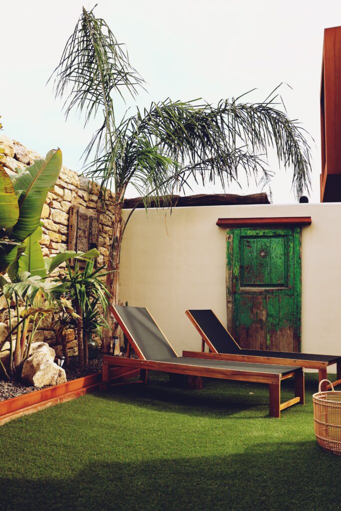 Private patio with sun loungers and jacuzzi in Villaverde Village